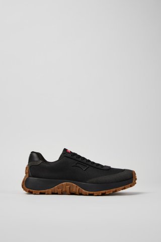 Camper Drift Trail - Schwarzer und grauer Damensneaker aus recyceltem PET und Leder. Camper Drift Trail - Schwarzer und grauer Damensneaker aus recyceltem PET und Leder.
