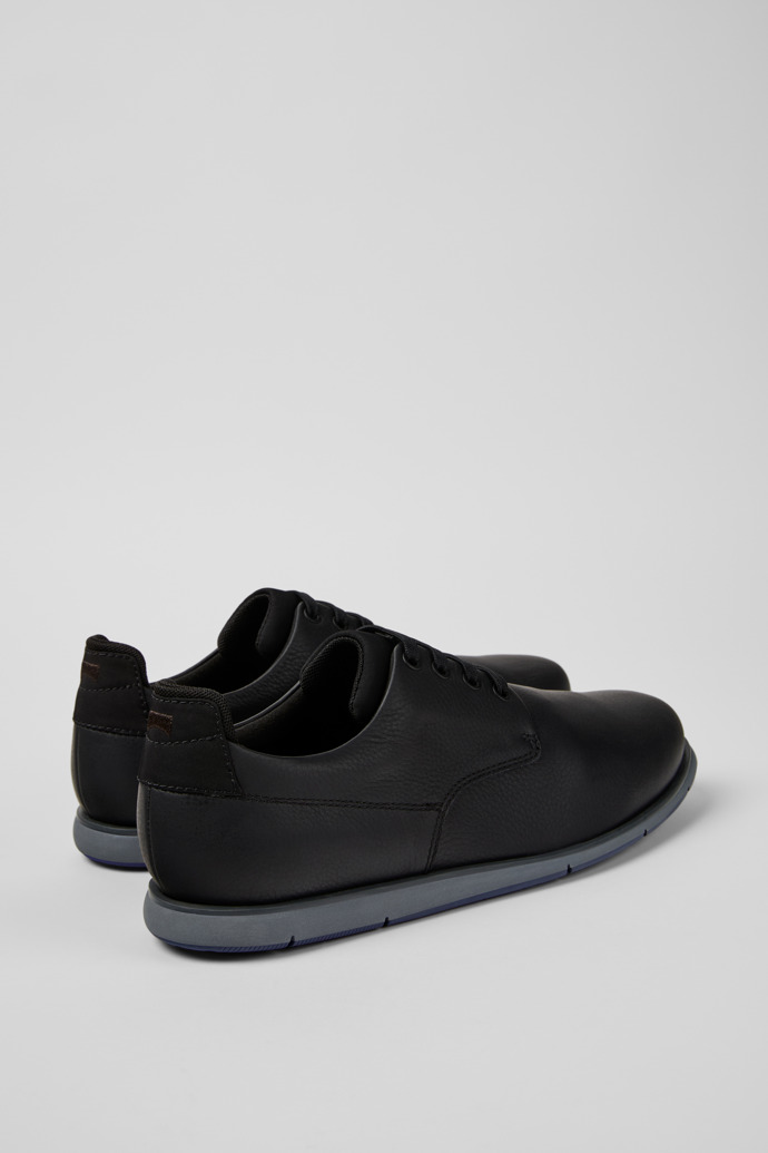 Camper Smith - Schwarzer Herrenschuh aus Leder und Textil.