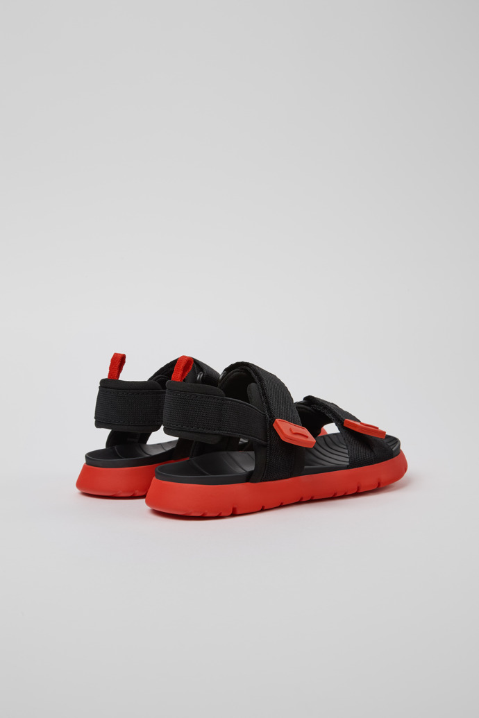 Camper Oruga - Schwarze Kindersandale aus Textil.