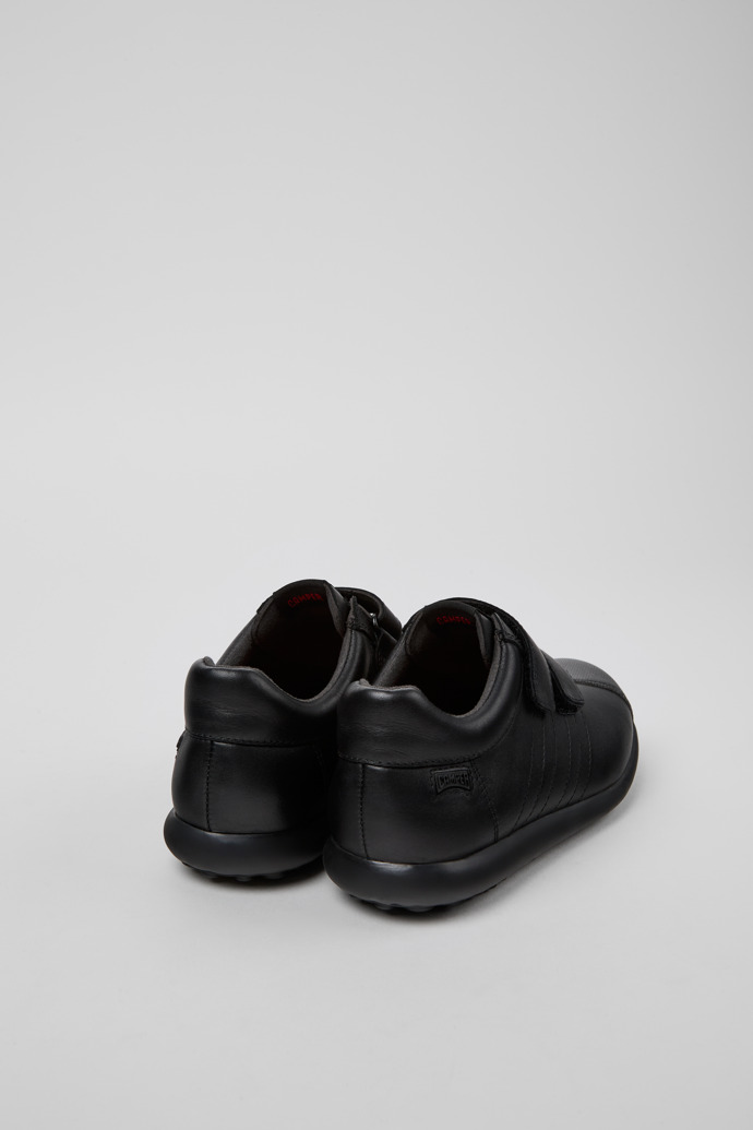 Camper Pelotas - Schwarzer Kinderschuh aus Leder und Textil.