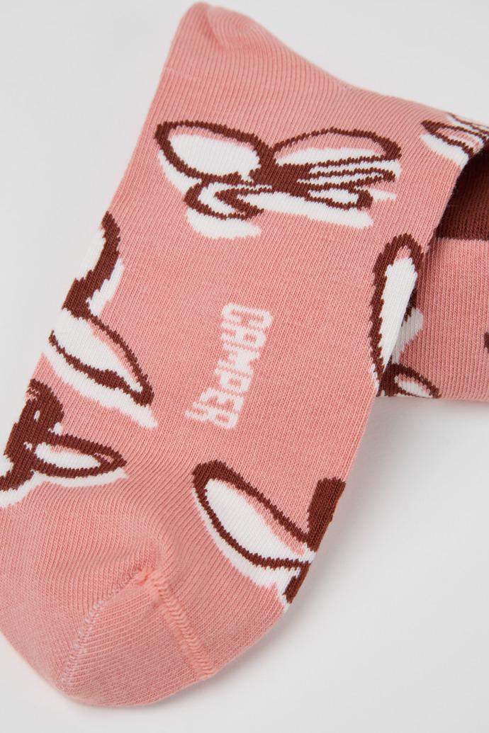 Camper Socks - Rosa-weiße Socken aus Bio-Baumwolle mit roter Musterung.