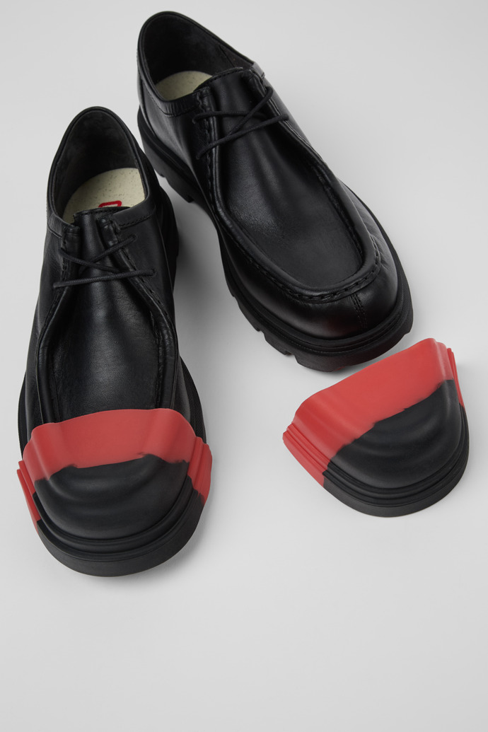 Camper Junction Toe Caps - Zehenaufsätze aus Gummi in Schwarz und Rot